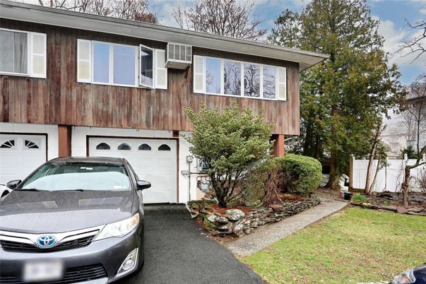 Attached, Exterior, Facade, Raised Ranch