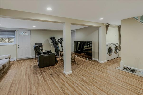 Fitness Equipment, Interior, Recessed Lighting, Utility Closets, Washer, Wood Texture Flooring