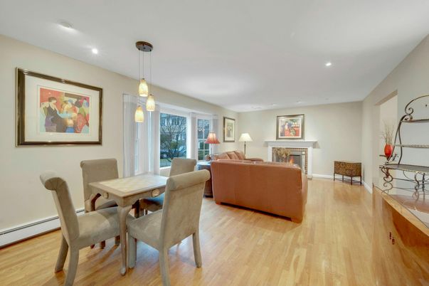 Dining room, Fireplace, Interior, Living room, Pendant Lights, Recessed Lighting, Wood Texture Flooring