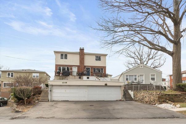 Attached, Exterior, Facade, Raised Ranch