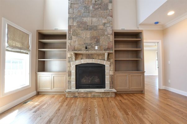 Fireplace, Interior, Recessed Lighting, Stone Walls, Wood Texture Flooring