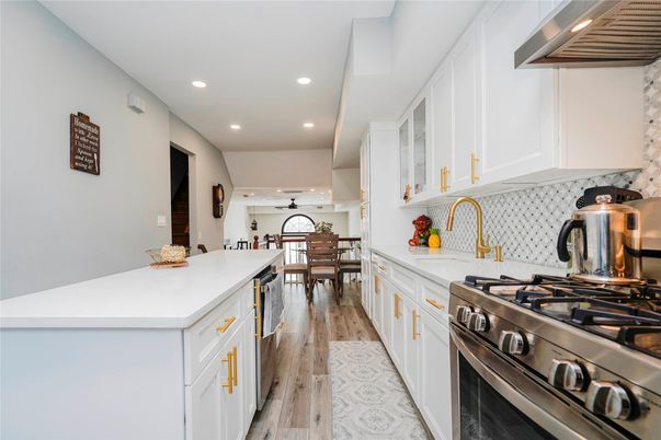 Dining room, Interior, Kitchen, Recessed Lighting, Stainless Steel Appliances, Wood Texture Flooring
