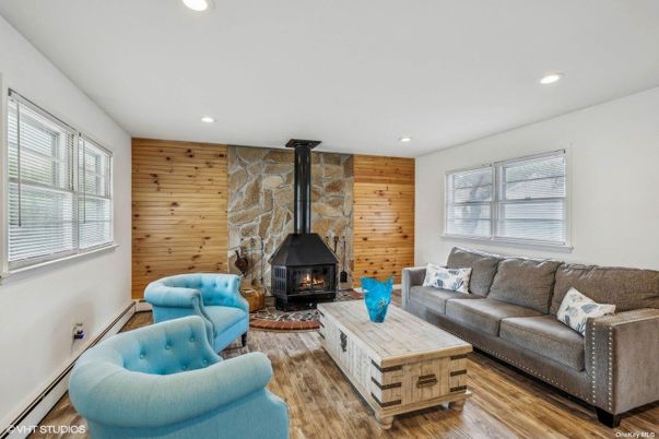 Fireplace, Interior, Living room, Recessed Lighting, Stone Walls, Wood Texture Flooring, Wooden Walls