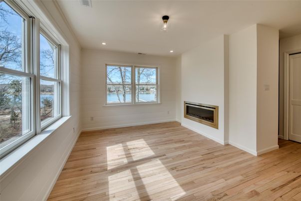 Empty room, Fireplace, Interior, Recessed Lighting, Wood Texture Flooring