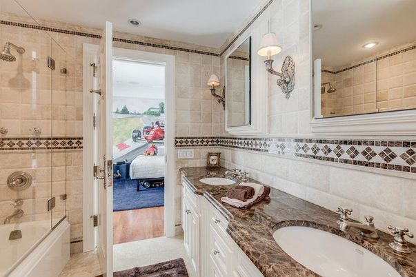 Bathroom, Dual Sink Vanities, Glass Shower, Interior, Recessed Lighting, Wood Texture Flooring