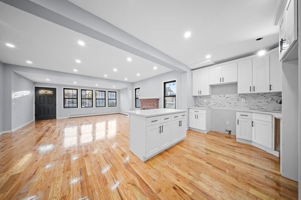 Interior, Kitchen, Marble Walls, Pendant Lights, Recessed Lighting, Wood Texture Flooring