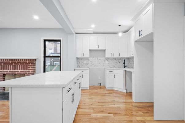 Interior, Kitchen, Marble Walls, Pendant Lights, Recessed Lighting, Wood Texture Flooring
