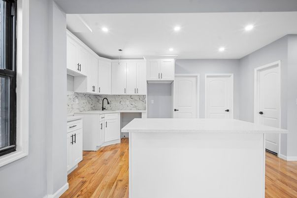 Interior, Kitchen, Marble Walls, Recessed Lighting, Wood Texture Flooring