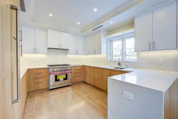 Interior, Kitchen, Marble Walls, Recessed Lighting, Stainless Steel Appliances, Wood Texture Flooring