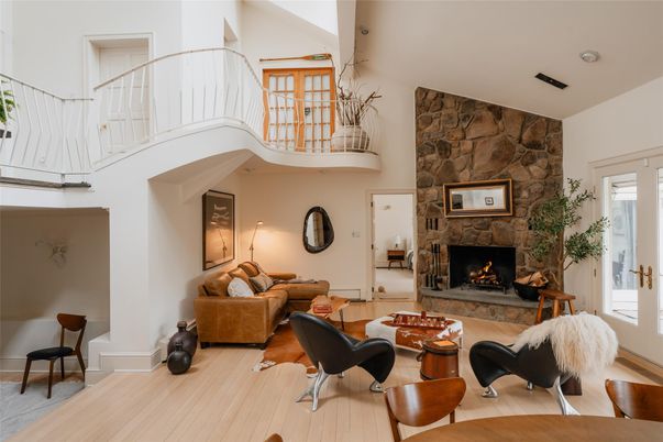 Fireplace, Interior, Living room, Recessed Lighting, Stone Walls, Wood Texture Flooring