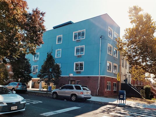 Exterior, Facade, Brick Facade, Condo Building