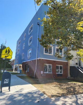 Exterior, Facade, Brick Facade, Condo Building