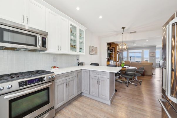 Dining room, Interior, Kitchen, Pendant Lights, Recessed Lighting, Stainless Steel Appliances, Wood Texture Flooring