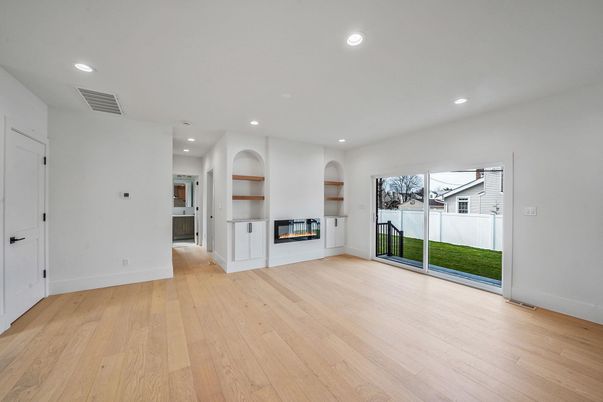 Empty room, Fireplace, Interior, Recessed Lighting, Wood Texture Flooring