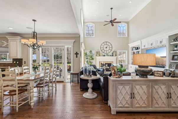 Chandelier, Dining room, Fireplace, Interior, Living room, Recessed Lighting, Wood Texture Flooring