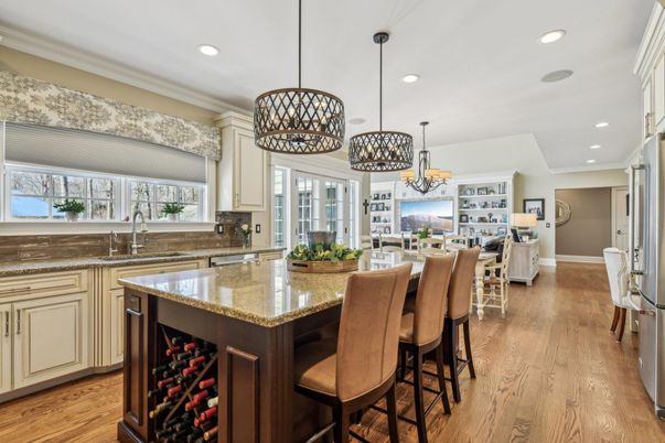 Chandelier, Dining room, Interior, Kitchen, Living room, Pendant Lights, Recessed Lighting, Wood Texture Flooring