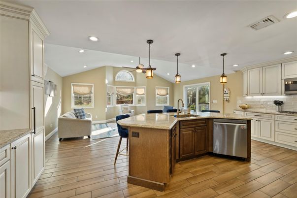 Dining room, Interior, Kitchen, Pendant Lights, Recessed Lighting, Stainless Steel Appliances, Wood Texture Flooring