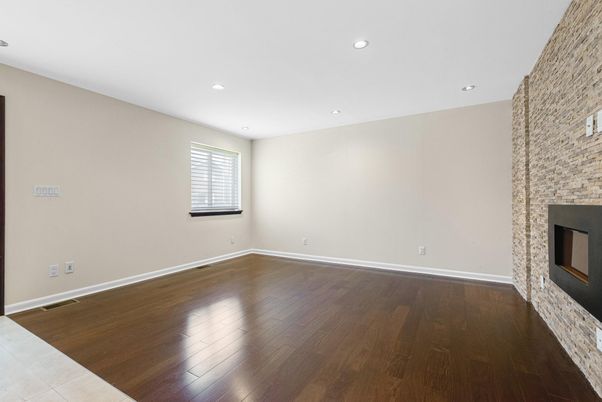 Empty room, Fireplace, Interior, Recessed Lighting, Wood Texture Flooring