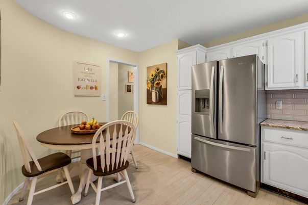 Dining room, Interior, Kitchen, Recessed Lighting, Stainless Steel Appliances, Wood Texture Flooring