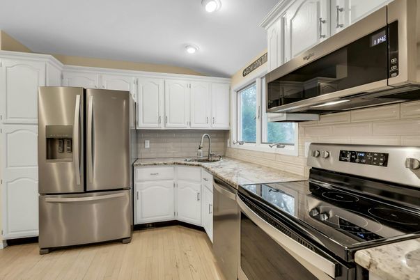 Interior, Kitchen, Recessed Lighting, Stainless Steel Appliances, Wood Texture Flooring
