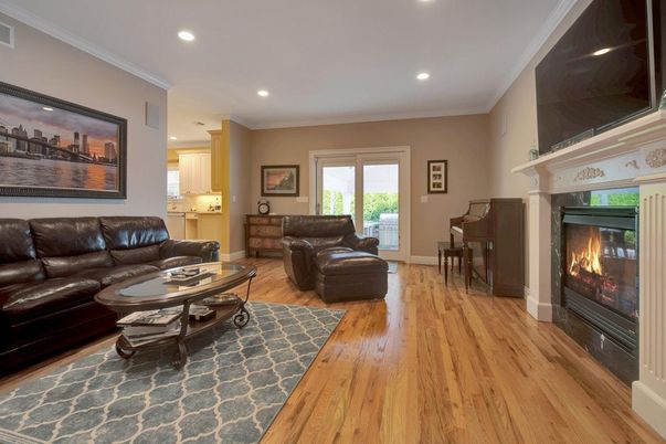 Fireplace, Interior, Living room, Piano, Recessed Lighting, Wood Texture Flooring