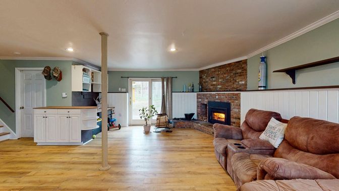 Fireplace, Interior, Living room, Recessed Lighting, Stone Walls, Wood Texture Flooring