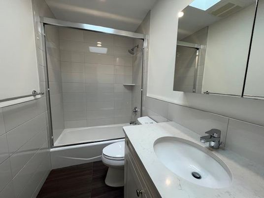 Bathroom, Glass Shower, Interior, Recessed Lighting, Wood Texture Flooring