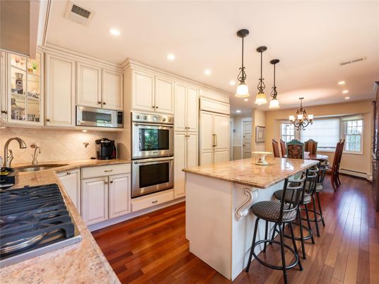 Chandelier, Dining room, Interior, Kitchen, Pendant Lights, Recessed Lighting, Stainless Steel Appliances, Wood Texture Flooring