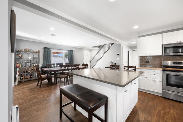 Dining room, Interior, Kitchen, Recessed Lighting, Stainless Steel Appliances, Wood Texture Flooring