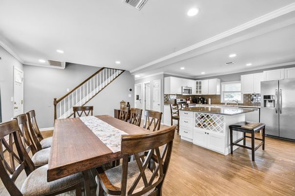 Dining room, Interior, Kitchen, Recessed Lighting, Stainless Steel Appliances, Wood Texture Flooring