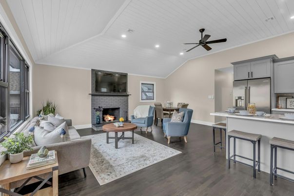 Dining room, Fireplace, Interior, Kitchen, Living room, Recessed Lighting, Stainless Steel Appliances, Wood Texture Flooring