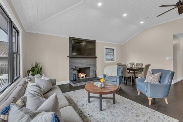Dining room, Fireplace, Interior, Living room, Recessed Lighting, Wood Texture Flooring