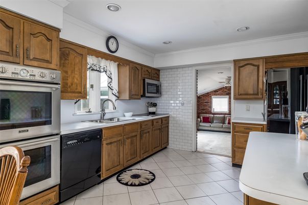 Interior, Kitchen, Recessed Lighting, Stainless Steel Appliances, Stone Walls