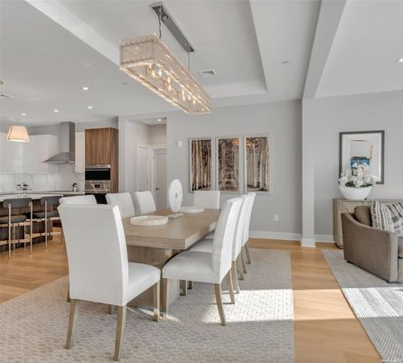 Chandelier, Dining room, Interior, Kitchen, Pendant Lights, Recessed Lighting, Stainless Steel Appliances, Wood Texture Flooring