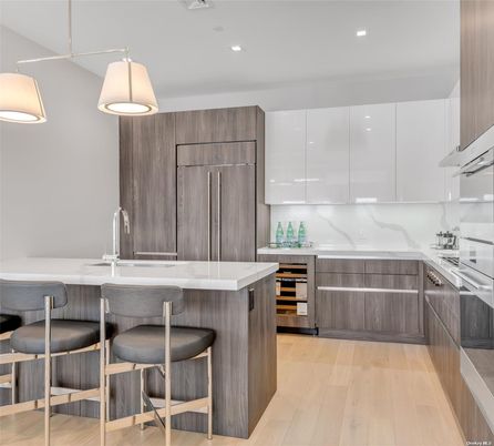 Interior, Kitchen, Marble Walls, Pendant Lights, Recessed Lighting, Stainless Steel Appliances, Wood Texture Flooring