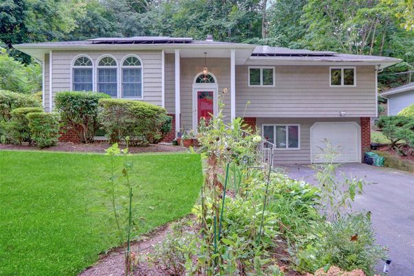Attached, Exterior, Facade, Solar Panels, Raised Ranch