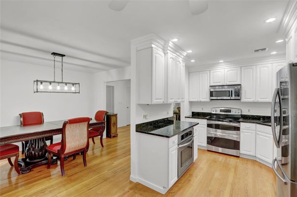 Dining room, Interior, Kitchen, Pendant Lights, Recessed Lighting, Stainless Steel Appliances, Wood Texture Flooring