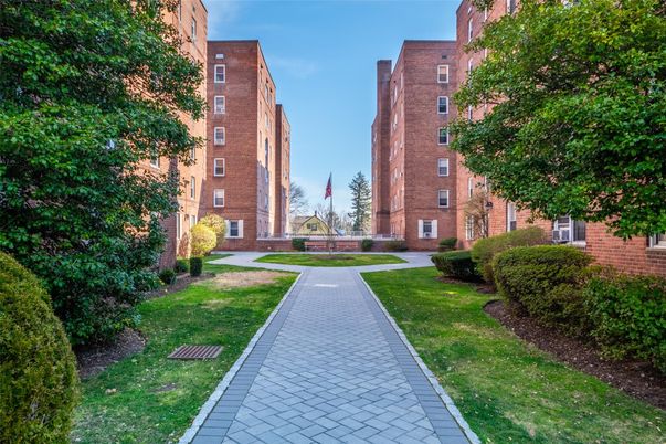 Exterior, Facade, Brick Facade, Condo Building