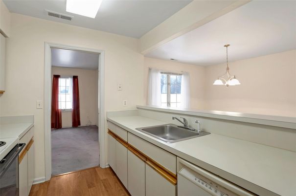 Interior, Kitchen, Pendant Lights, Tile Countertops, Wood Texture Flooring