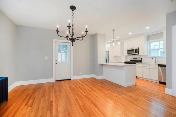 Chandelier, Interior, Kitchen, Pendant Lights, Recessed Lighting, Stainless Steel Appliances, Wood Texture Flooring