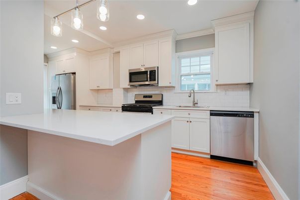 Interior, Kitchen, Recessed Lighting, Stainless Steel Appliances, Wood Texture Flooring