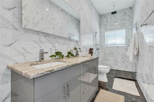 Bathroom, Dual Sink Vanities, Glass Shower, Interior, Marble Walls
