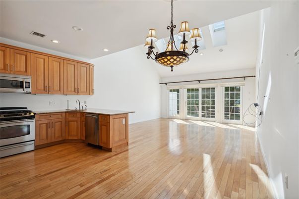 Chandelier, Interior, Kitchen, Recessed Lighting, Stainless Steel Appliances, Wood Texture Flooring