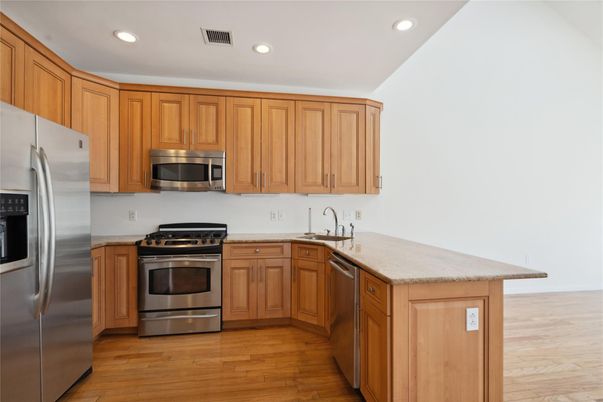 Interior, Kitchen, Recessed Lighting, Stainless Steel Appliances, Wood Texture Flooring