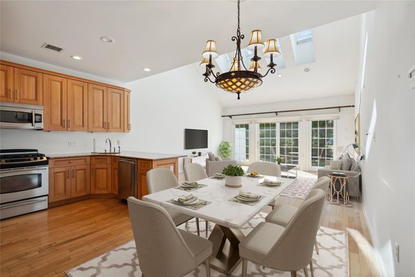 Chandelier, Dining room, Interior, Kitchen, Recessed Lighting, Stainless Steel Appliances, Wood Texture Flooring