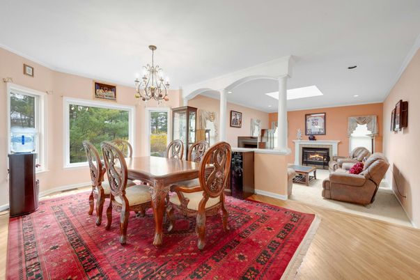 Chandelier, Dining room, Fireplace, Interior, Living room, Recessed Lighting, Wood Texture Flooring