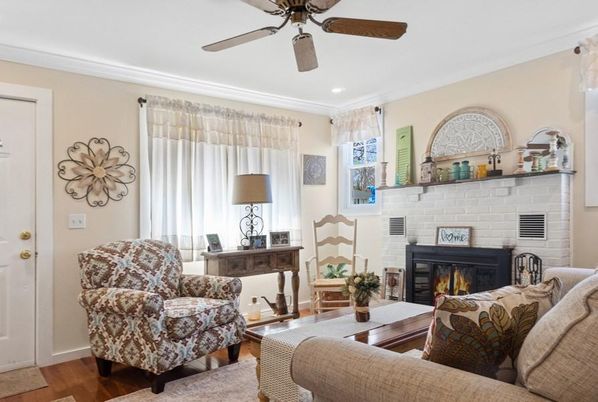 Fireplace, Interior, Living room, Recessed Lighting, Stone Walls, Wood Texture Flooring