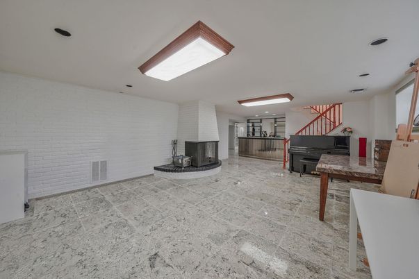 Fireplace, Interior, Piano, Recessed Lighting, Stone Walls