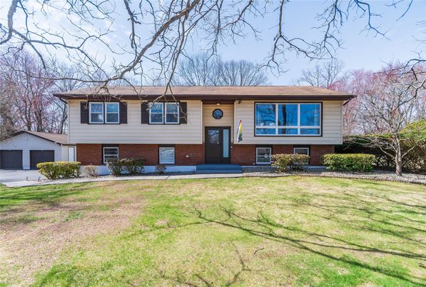 Attached, Exterior, Facade, Brick Facade, Raised Ranch