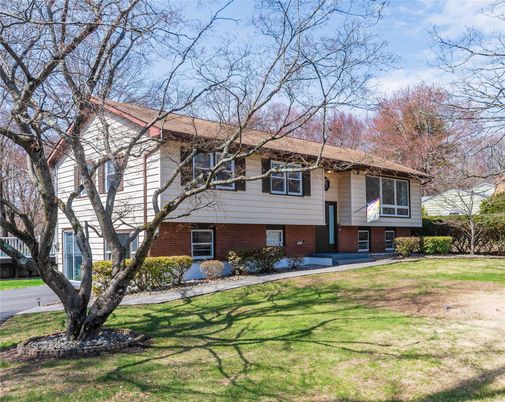 Exterior, Facade, Brick Facade, Raised Ranch